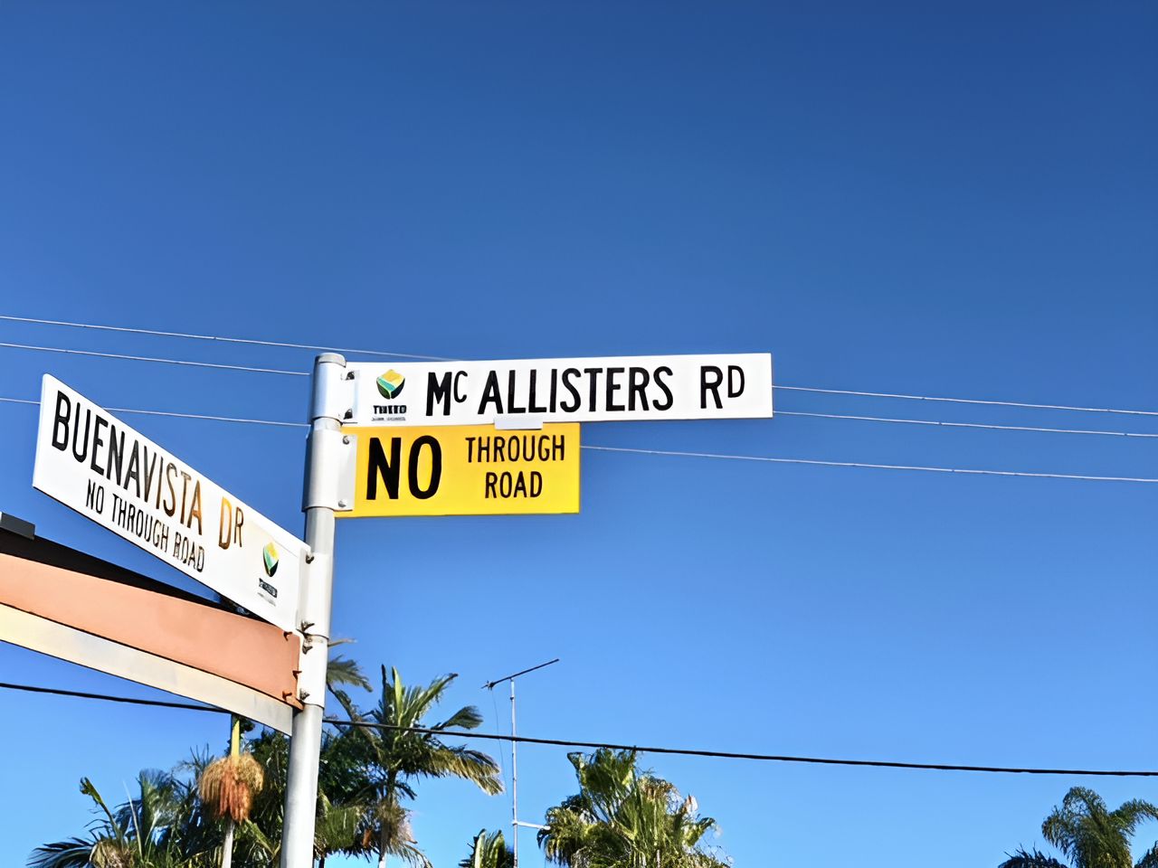 A Street Sign That Says Mcallisters Rd On It — One Lane Financial In Burdell, QLD 
