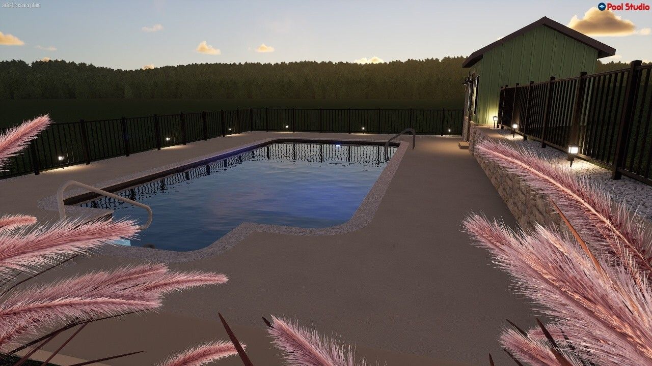 A rectangular swimming pool surrounded by a patio at dusk, with a wooden fence and grassy hill in the background.