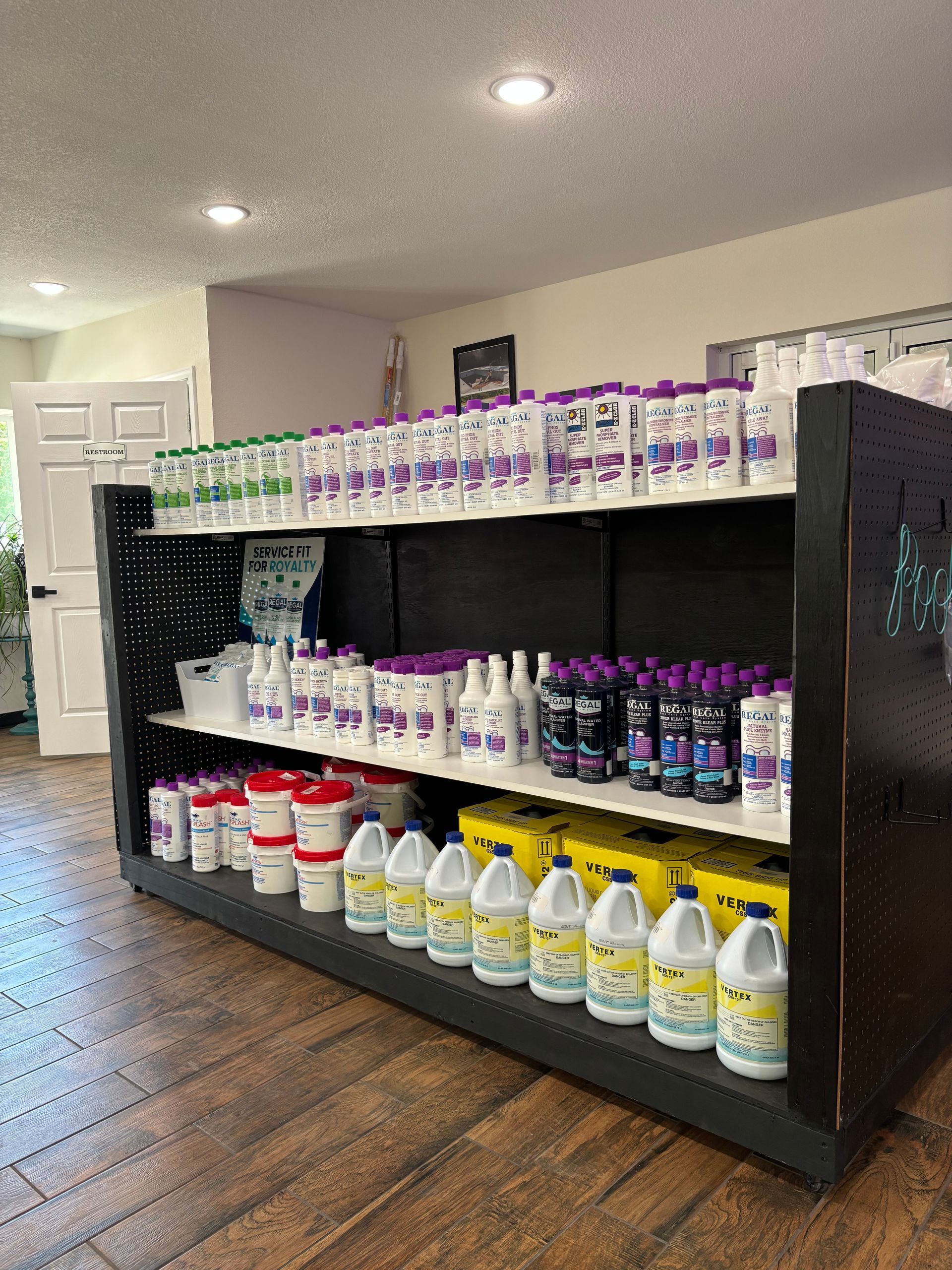 A store shelf filled with lots of cleaning supplies.