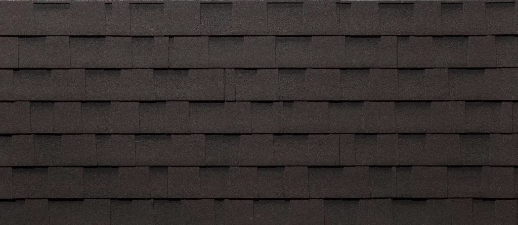 Un gros plan d'un toit recouvert de bardeaux.