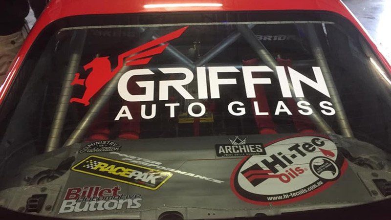 griffin auto glass logo on car window