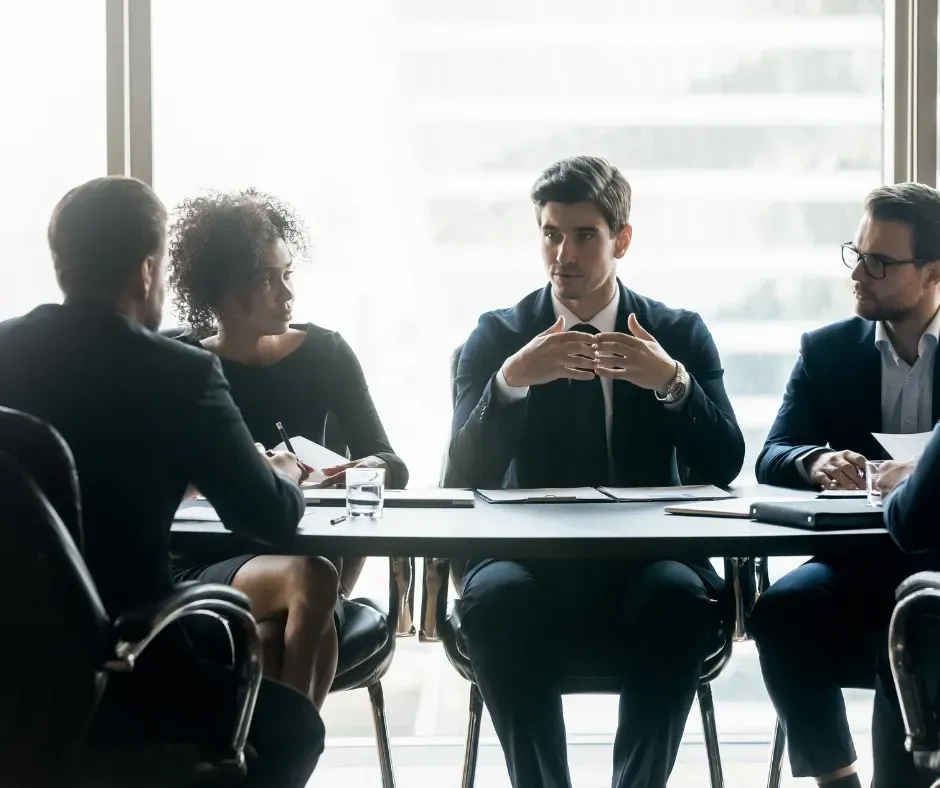 New executive hire collaborating with leadership team after successful executive search placement Chelmsford Massachusetts