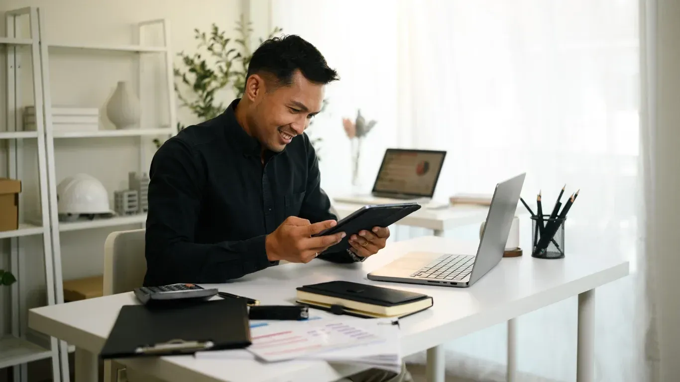 Small business owner celebrating success and growth after partnering with KPI Solutions business advisory in Chelmsford MA