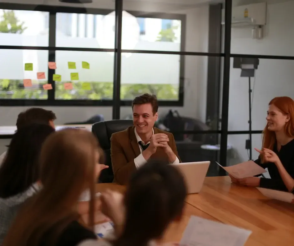 New executive hire collaborating with leadership team after successful executive search placement Chelmsford Massachusetts