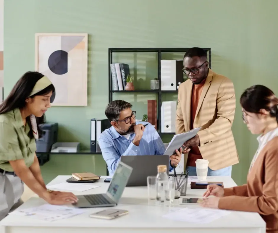 Organized efficient office environment team working collaboratively after administrative systems implementation Chelmsford MA