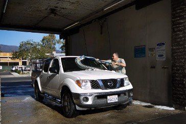 Car Wash — Worker Washing Car in Santa Barbara, CA