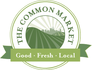 The Common Market logo with green fields, city skyline, and text: