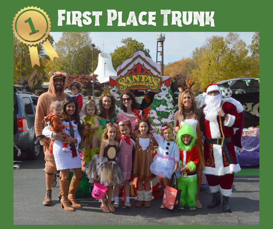 Students and Families posing in costumes