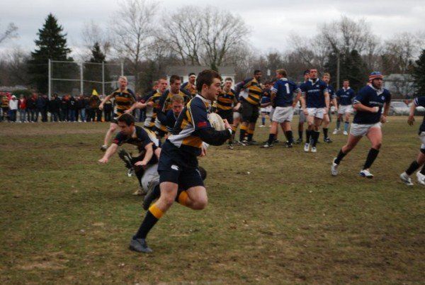 A rugby player with the number 1 on his jersey