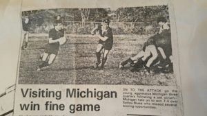 A newspaper article about visiting michigan win a fine game
