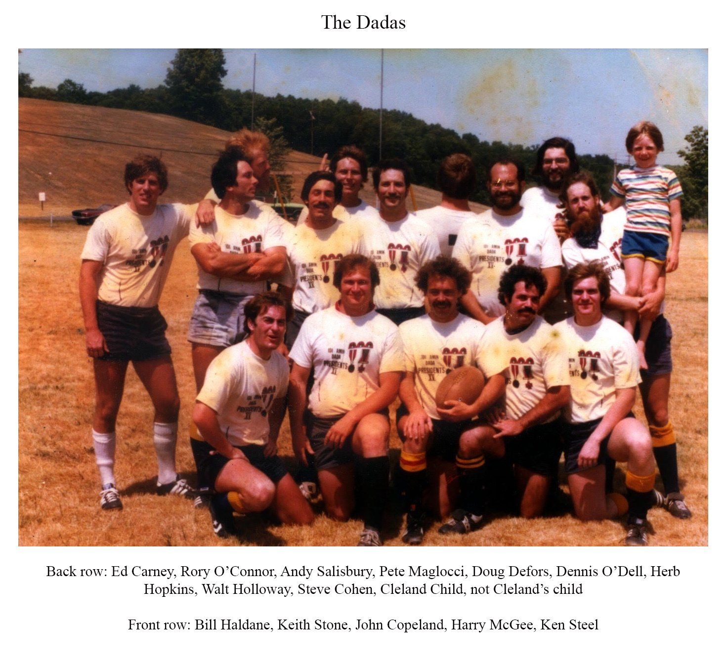 A group of people posing for a picture with the word the on the bottom