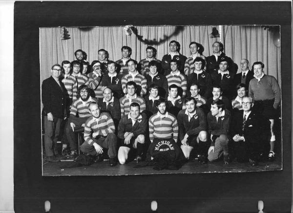 A black and white photo of a group of people