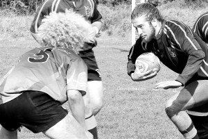 A rugby player with the number 5 on his jersey