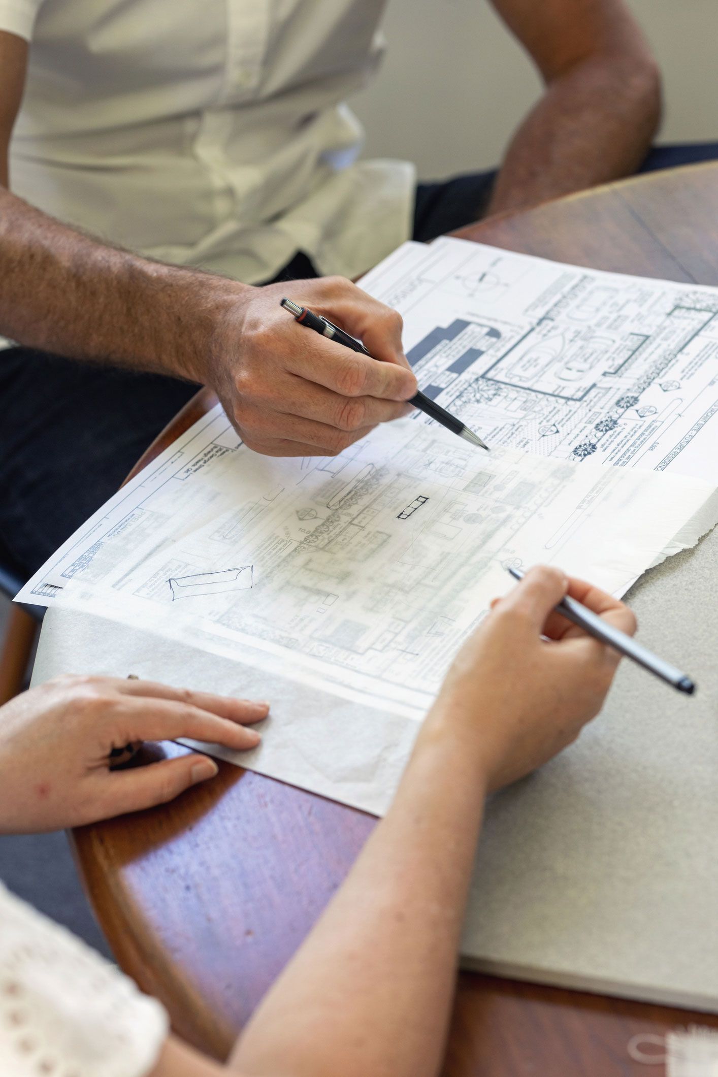 Designers Collaborating in Plans — Glenmore Park, NSW — Advanced Building Design