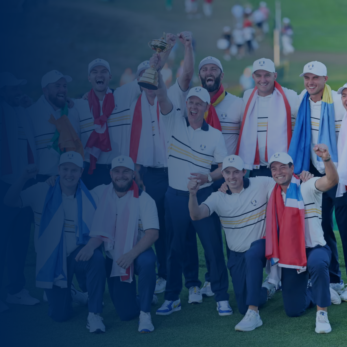 European golf team celebrates victory, holding a trophy. Blue and white uniforms, cheering.