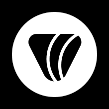 Village Community Church logo in a white circle on a black background.