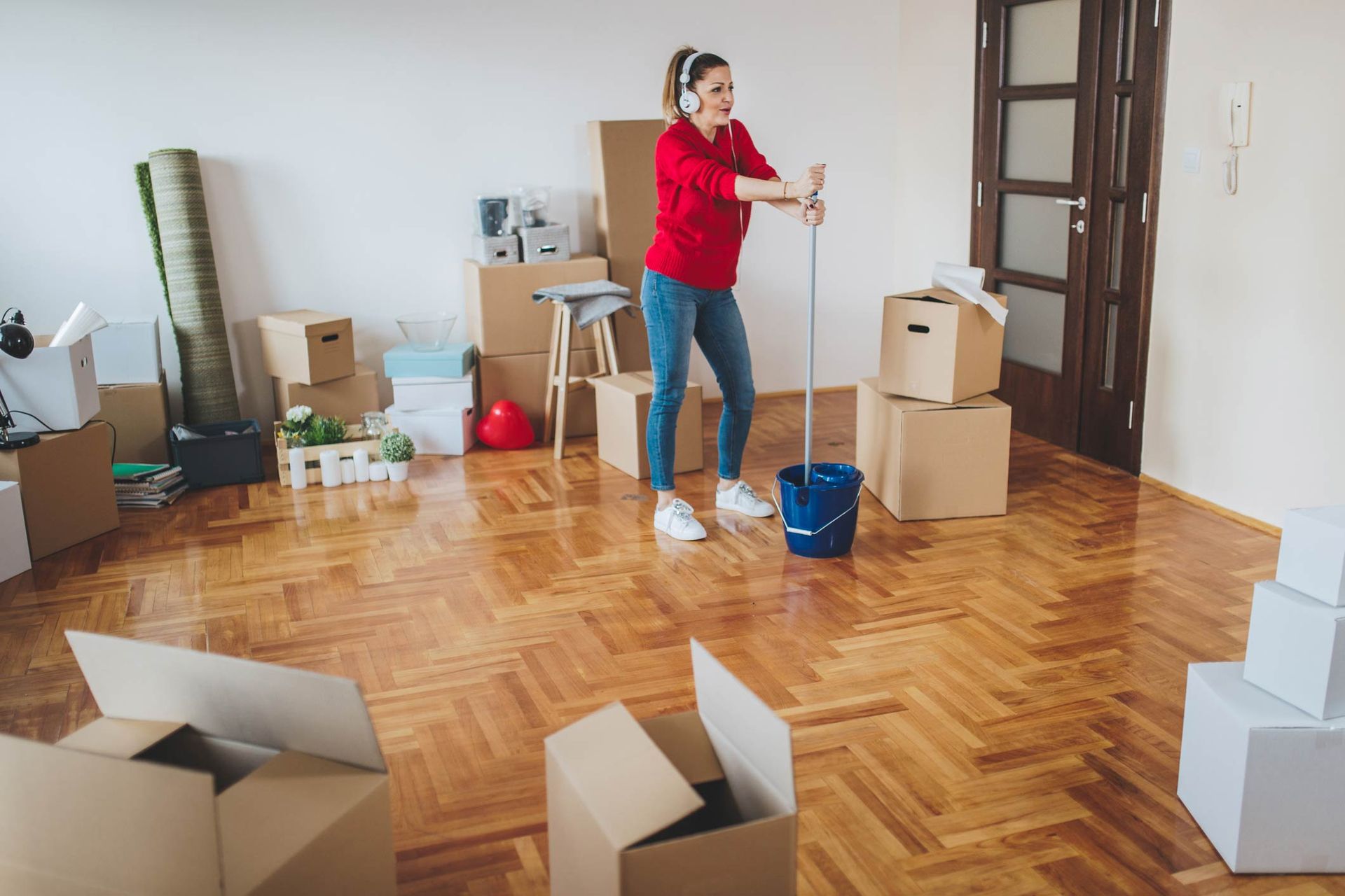 Gorgeous Woman Dancing And Singing While Cleaning A New Apartment — Coeur D'Alene, ID — Mad Clean LLC