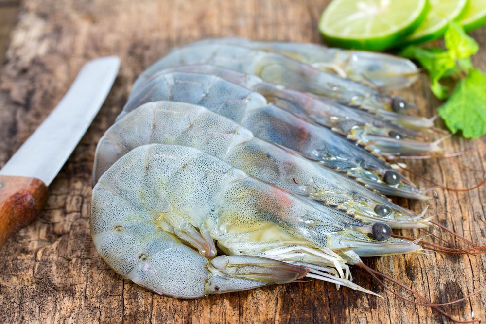 Fresh Shrimps On A Wooden Table — Swifty's Lismore Seafood Market In Lismore, NSW