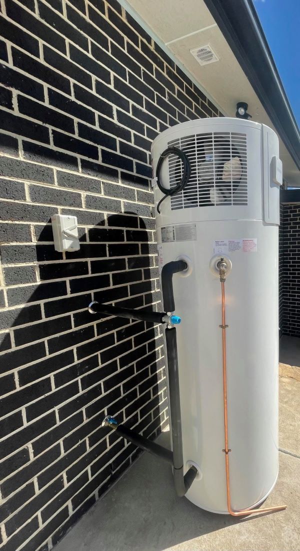 A Close Up of a Drain Pipe With a Lot of Dirty Water Coming Out of It — Smooth Flow Plumbing Cairns in Northern Beaches, NSW