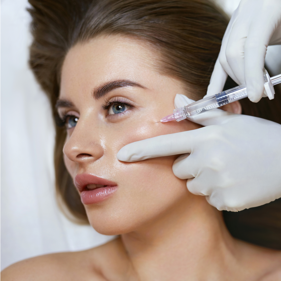 a woman is getting a botox injection in her face 