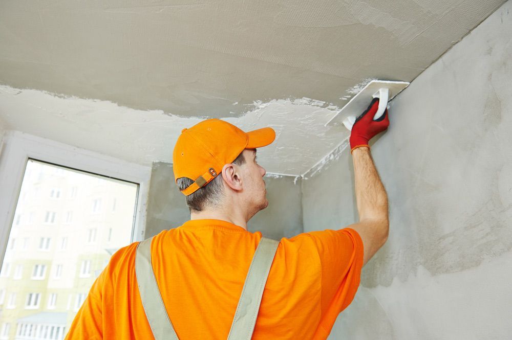 Plasterer at Indoor Ceiling — Painters in Parkes