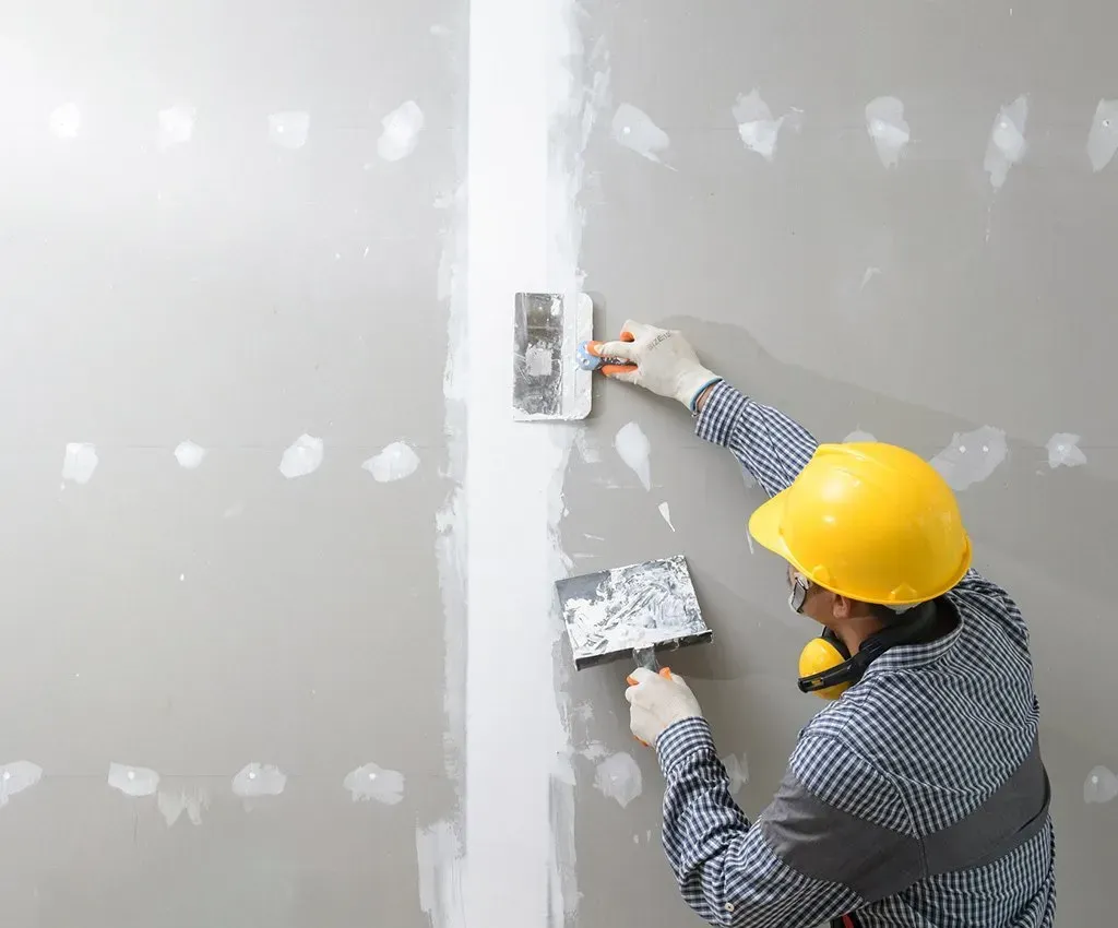 Man Plastering the Wall — Painters and Decorators in Dubbo