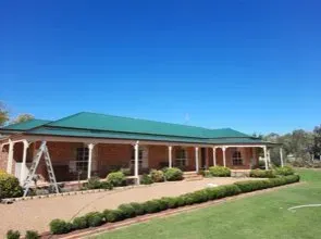 House with Green Roof — Painters and Decorators in Dubbo
