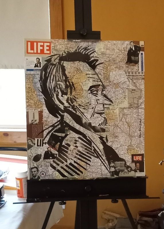 Black-and-white portrait of Abraham Lincoln on a LIFE magazine cover, displayed on an easel