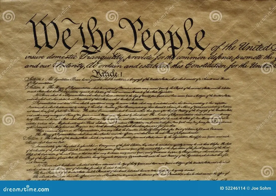 Close-up of the U.S. Constitution with the words “We the People” on aged parchment.