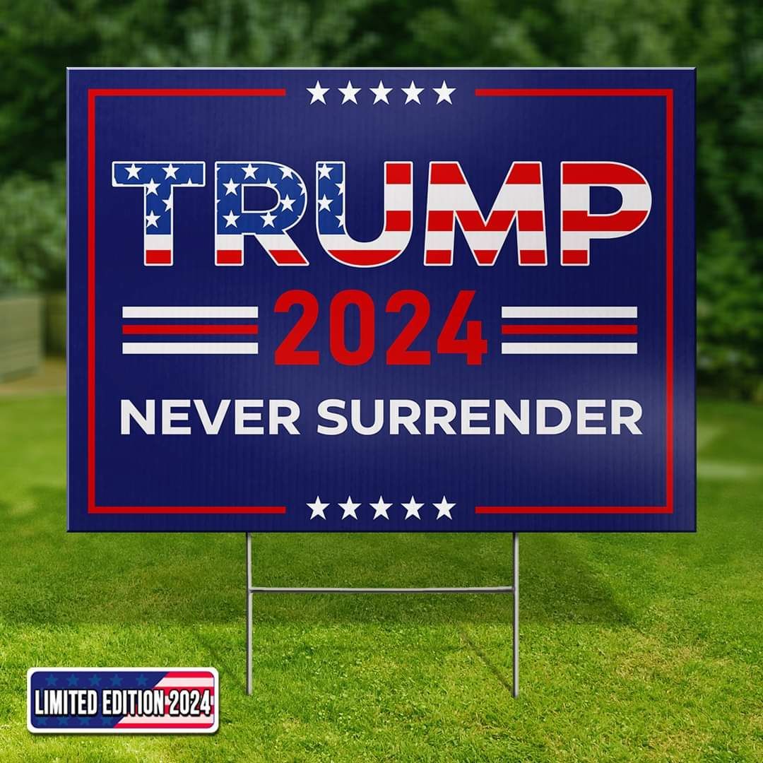 Trump 2024 yard sign with American flag styling and “Never Surrender” slogan on grass