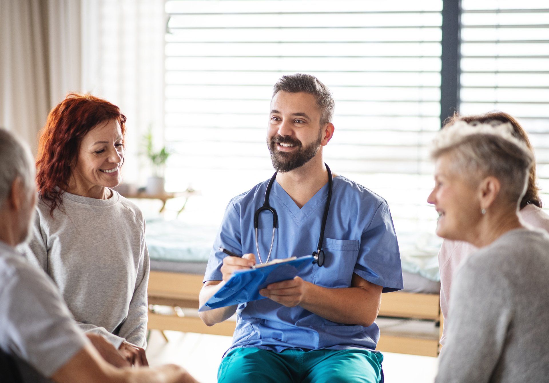 Healthcare Worker Talking to Senior Patients — Santa Rosa, CA — Santa Rosa Treatment Program