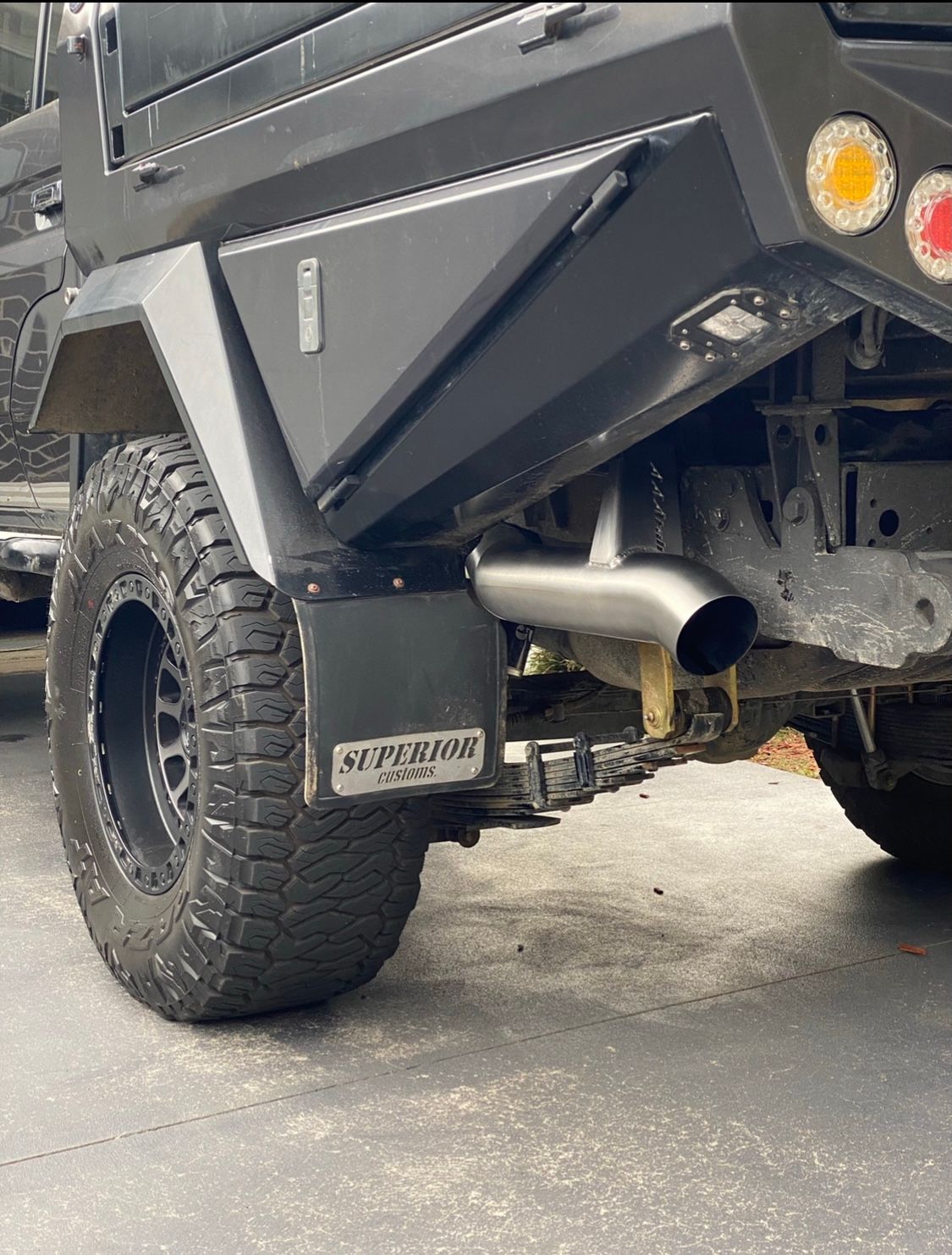 Car Wheel on A Lift Being Aligned by A Technician — S&P Complete Automotive in Port Macquarie, NSW