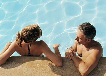 Couple on Swimming Pool – Pool and Spa Shop in Lanesborough, MA