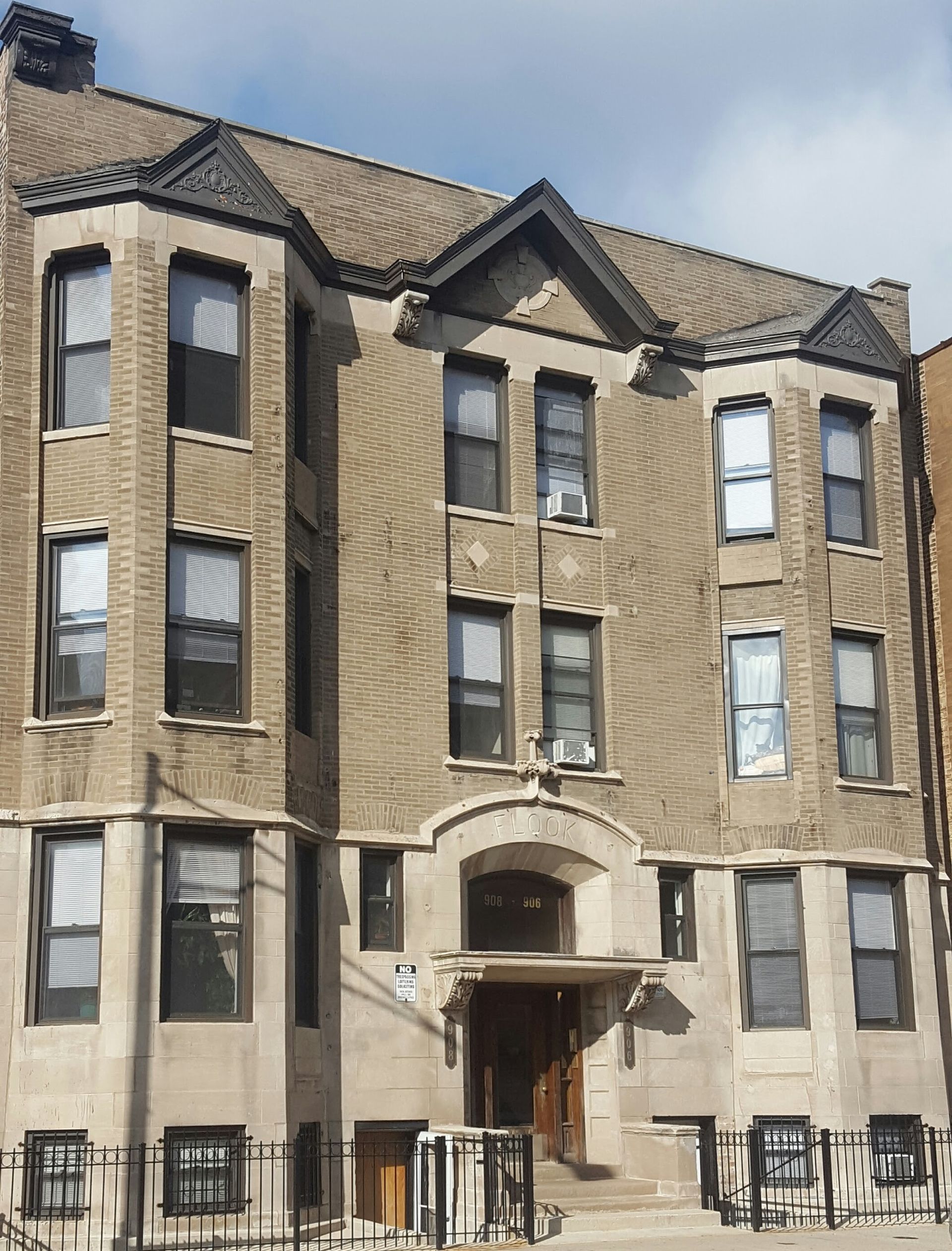 A large brick building with a lot of windows