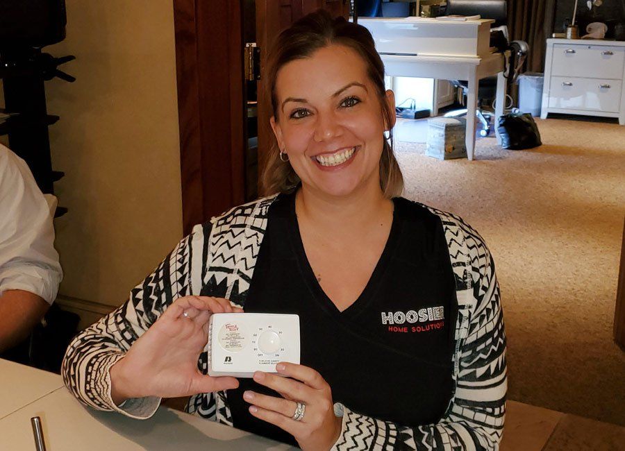 Woman Holding Tool — Naples, FL — Home Watch Academy