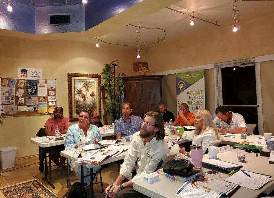 Trainees Listening on a Training — Naples, FL — Home Watch Academy