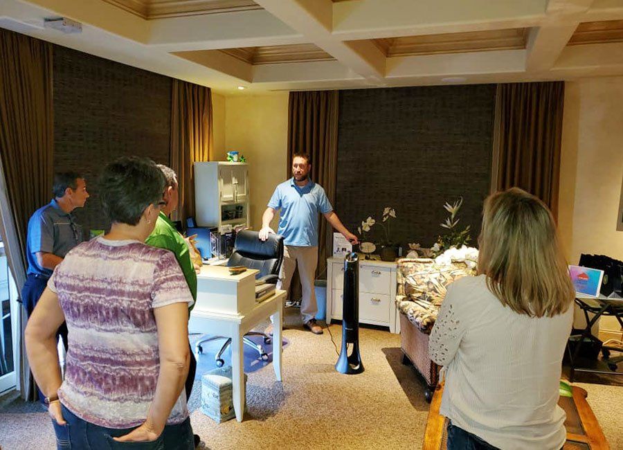 Men and Women Standing — Naples, FL — Home Watch Academy