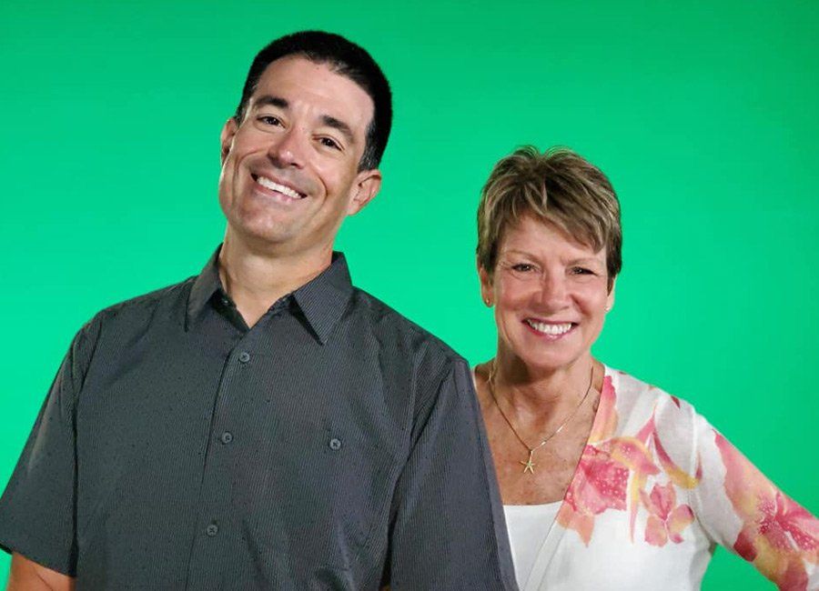 Diane and a Man Smiling — Naples, FL — Home Watch Academy