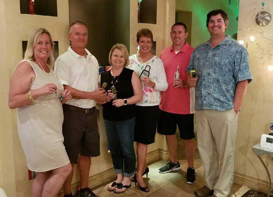 People Holding Tools — Naples, FL — Home Watch Academy