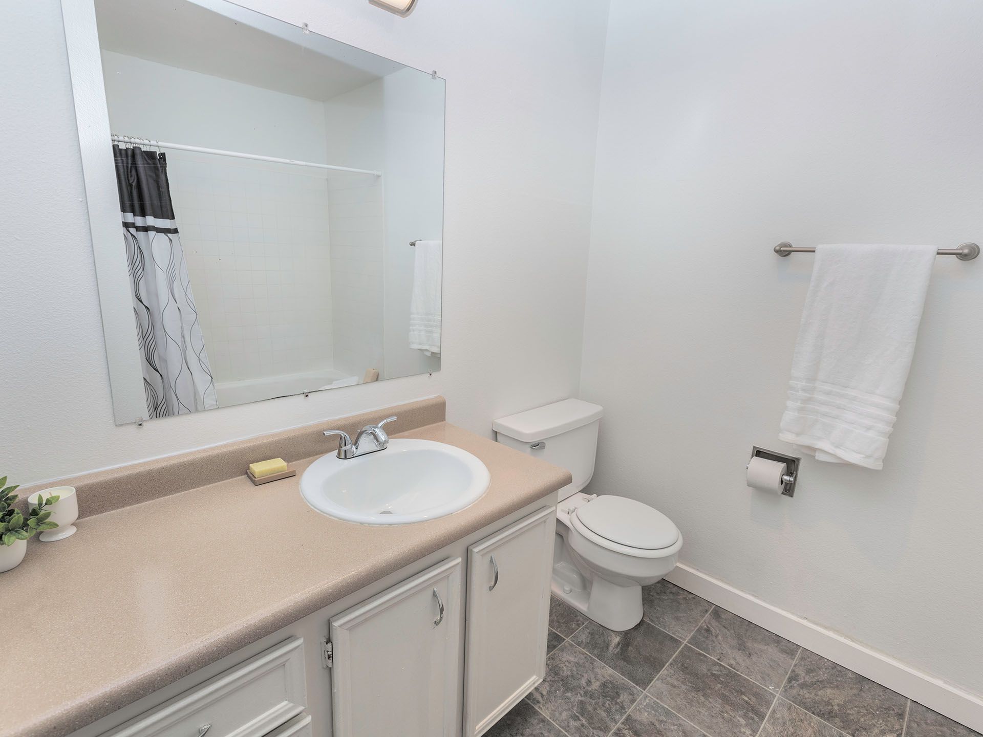 Photo of bathroom showing a long sink