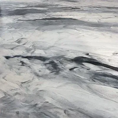 Abstract gray and silver marbled epoxy floor, with flowing and swirling patterns.