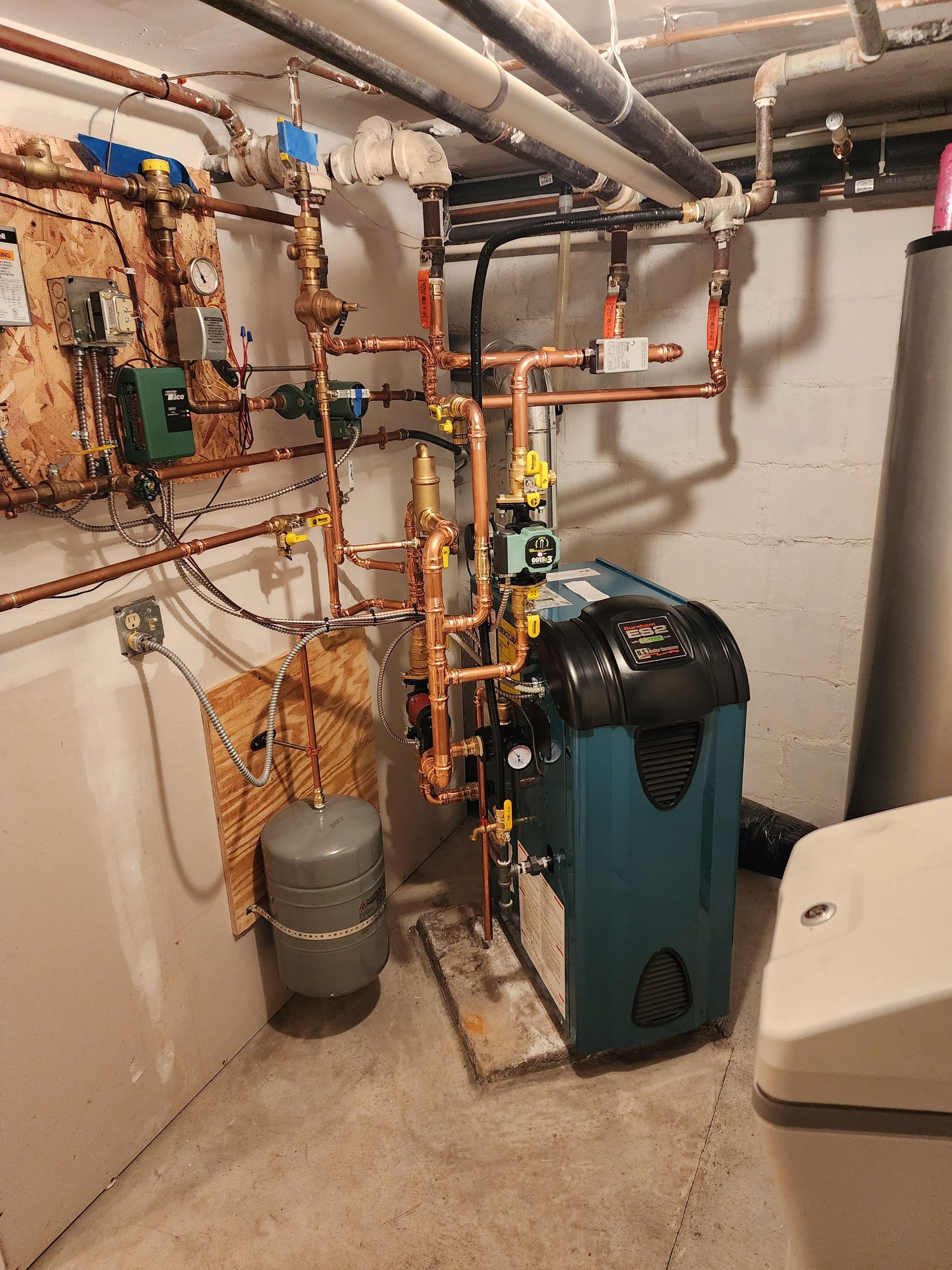 A person is walking barefoot on a rug in a living room.