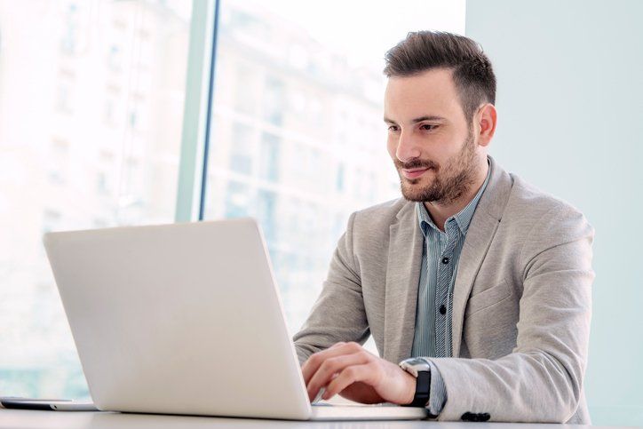 Man Working In The Office — Indianapolis, IN — Intecare