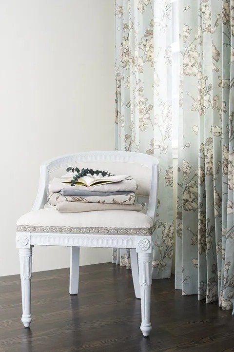 White Chair With Nice Curtains