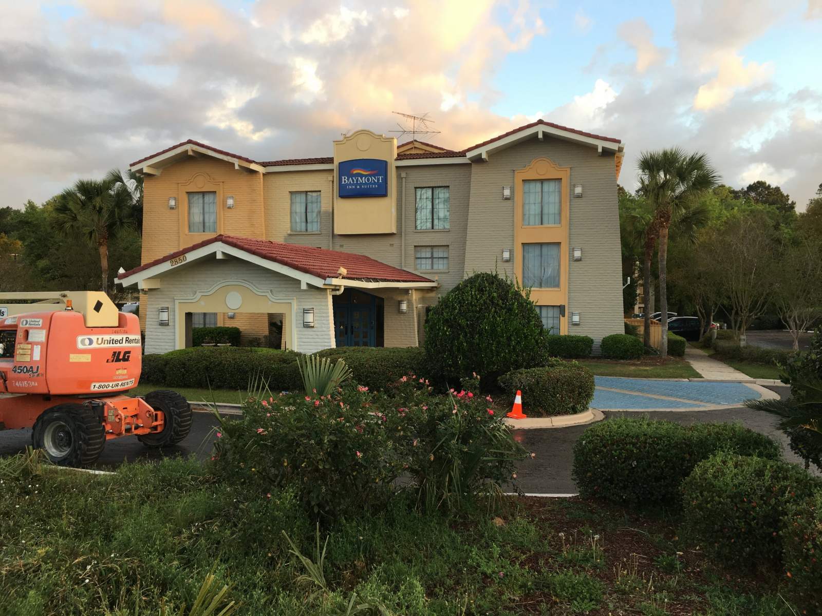 Baymont Inn and Suites Being Painted in Orange — Vero Beach, FL — Bucio Painting Inc.