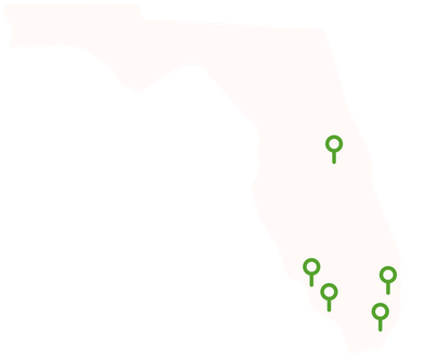 A map of florida with green pins on it.