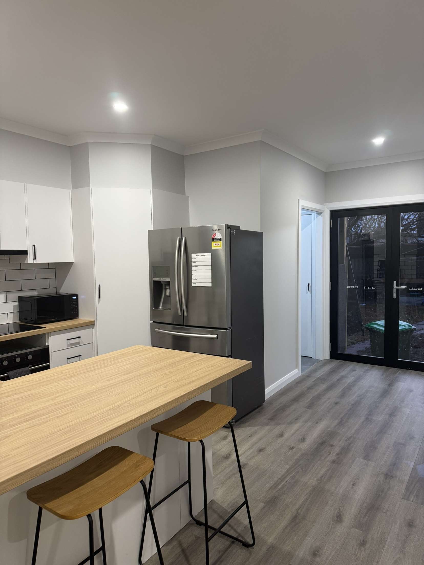 Grey Kitchen With Stainless Steel Appliances — The Wright Way Building In North Albury, NSW