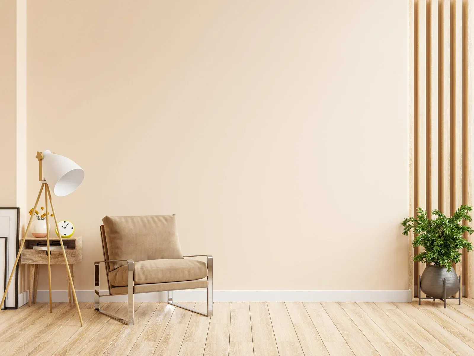 Minimal beige living room with a wooden chair, side table, lamp, and potted plant