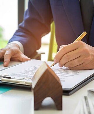 Client signing contract of insurance agency — Homeowner's Insurance in Merrillville, IN