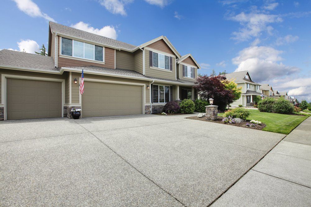 suburban house with a large driveway